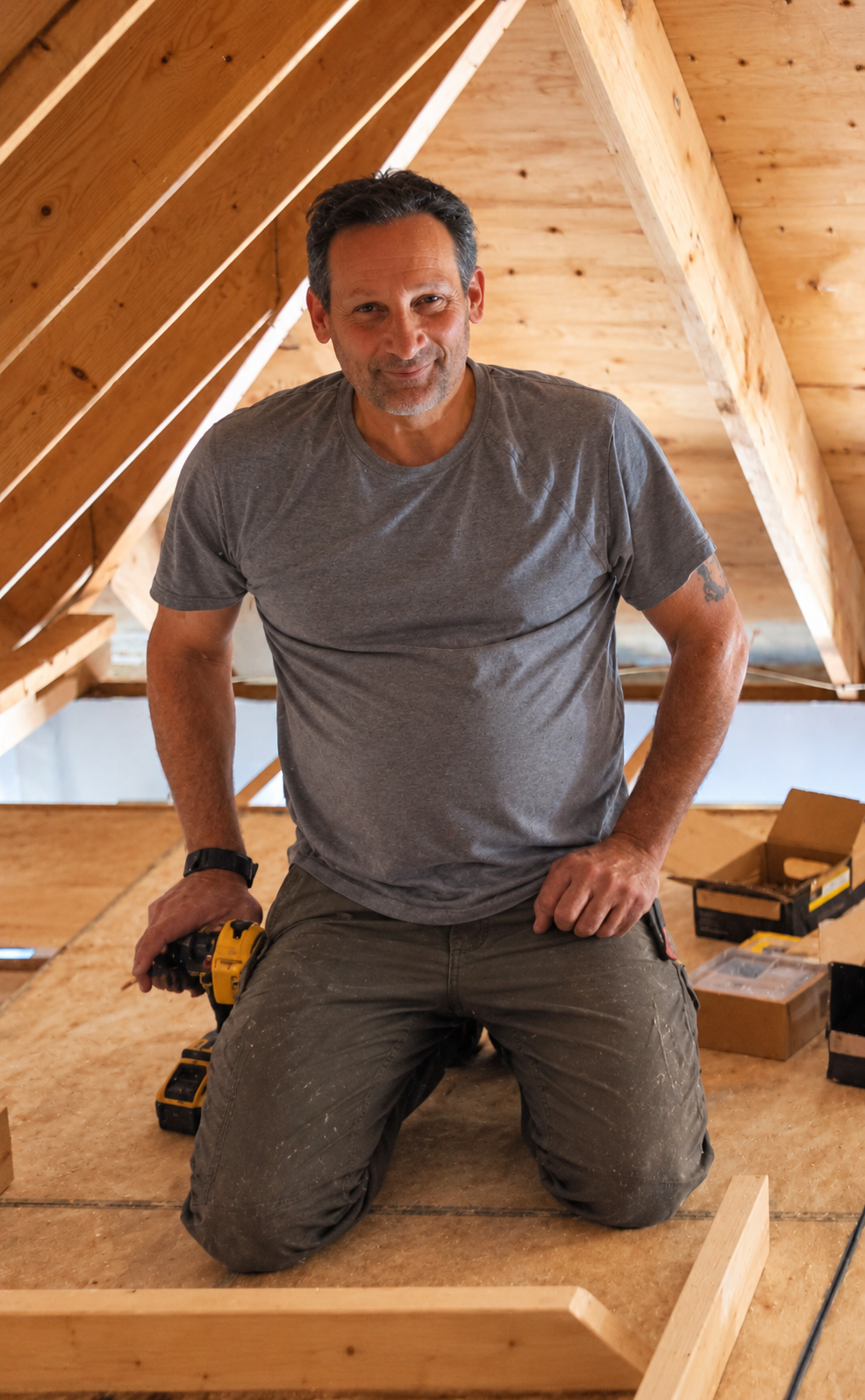 Paul Kern, owner of Earth Smart Building and Remodeling, at a timber framing project